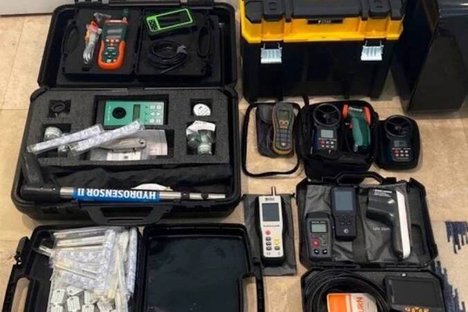 FixMold technician inspecting mold in a residential property